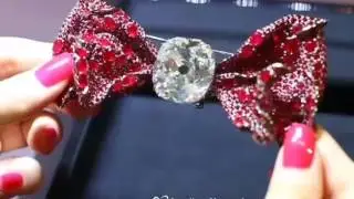 Bow tie brooch by Cindy Chao  with 76 carat old-mine-cut diamond and rubies
