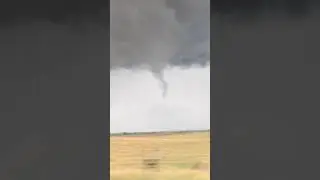 Funnel halfway down just outside of Loyal, OK but then it quickly dissipates!