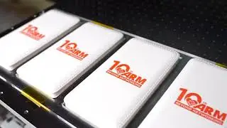 สกรีนโลโก้ลงบน power bank ลาย 10th ARM Beyond networking