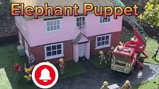 Elephant Puppet Sees A Model House On Fire