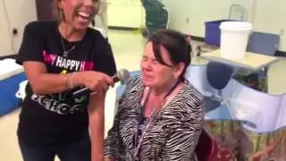 Mrs. Salazar getting ready to eat a worm!