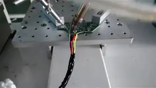 soldering wire to PCB board assembly by soldering machine robot