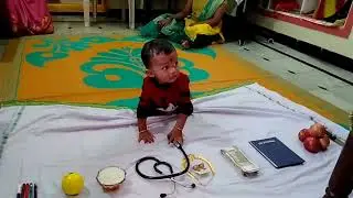 Teju Future prediction by Routine Traditional Item  pickup Method. Annaprashan Ceremony