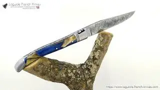 Laguiole knife Damascus blade with handle in fragments of mammoth ivory and blue colored resin