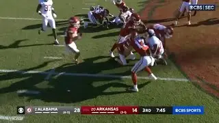 Arkansas kicker recovers own onside kick