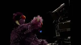 Sesame Street The Two Headed Monster Looks At The Camera While 6 Disney Sneak Peeks