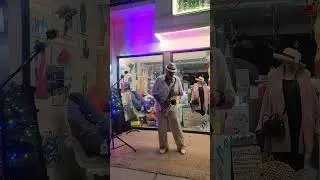 Sax on The Street - Umbrellas of Sherburg