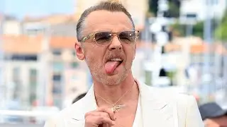 Simon Pegg's Diamond Gun Necklace: Edgy New Look Sparks Debate!