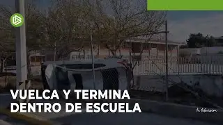 Vuelca y termina dentro de escuela
