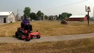 Dust Yellow Grass and Weeds Mowing in a Drought