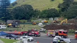 Workers dig for the missing, one day after New Zealand landslide | AFP