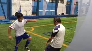 James Lung and Jhonathan Limbu play football