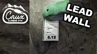 Crux 5.12 on feature lead wall