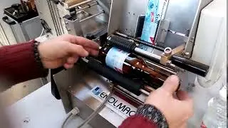ENOLMAC s.n.c. - WET GLUE LABELLER SEMIAUTOMATIC SIRIO mod.3 - PLUS