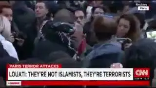 Paris attacks:Blindfolded Muslim Man Offers Hugs In Paris