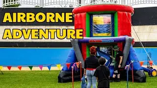 Soar to New Heights with the Airborne Adventure: The Ultimate Parachute Inflatable Ride! 🪂🚀