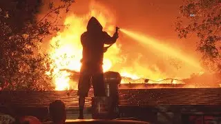 Homeowners Attempt to Quell Fire Burning at Rear of Homes in Arleta Overnight.