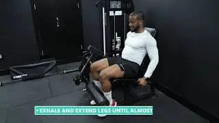 How To Do Machine Leg Extensions | Exercise Demo