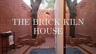 Nature's Mark on a Red Brick House: Witnessing the Beauty of Time