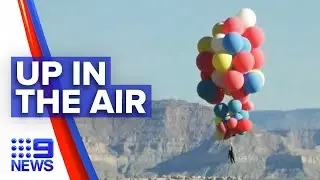 Magician flies over desert with 50 balloons | 9 News Australia