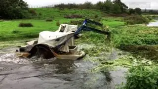 Weed cutter boats clearing a blockage on the Karamu stream