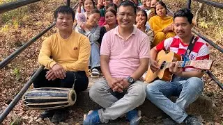 Singing Hymn No.500 ( मादल र गितारको साथमा भजन न. ५०० गाउँदै बलिदान मण्डलीका जवानहरु)