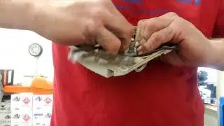 installing recoil spring for a stihl