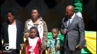 Justin Kundalin  family - Singing group sing during the 41st annual convention @ porgera 