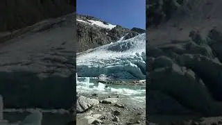 Swimming above Wedgemont lake, in glacier meltwater, Whistler, Canada