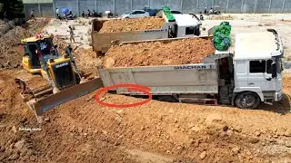 Be careful !! heavy dump truck stuck landslide recovery by skill operator bulldozer help push 
