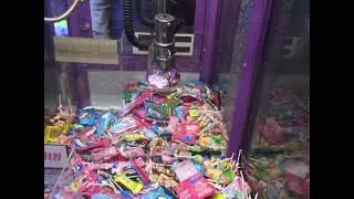 I won a pop it keychain (PLUS TWO PIECES OF CANDY) from the candy claw machine