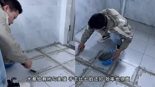 小陈的老挝媳妇儿  大哥给厕所勾美缝 手艺比七伯还好 效率也很高