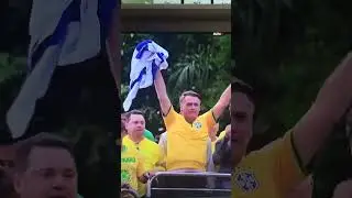 Former Brazilian President Bolsonaro embraces Israeli flag during rally