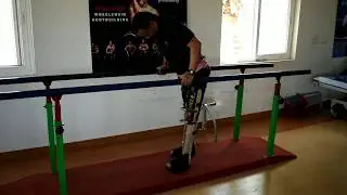spinal injured T9 Complete paraplegia parallel bar walking skills