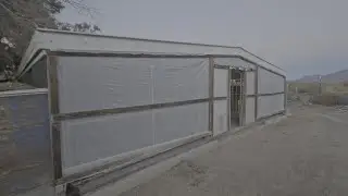 Passive solar heat and wind protection for our kennels