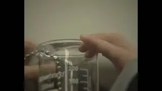 Slow motion Mould effect (chain fountain) with 2N weight attached to the end of the chain