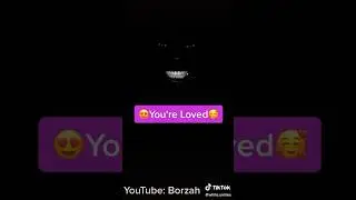 Black man smiling in the dark