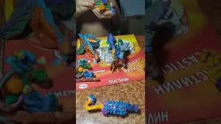 little son sculpts dinosaur and spinosaurs. сыночек лепит динозавров и спинозавров.