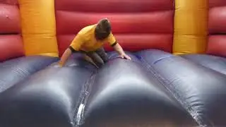 In soccer Shoes on my Bouncy Castle