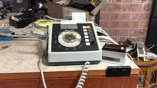 Calling Rick Astley on vintage office phone