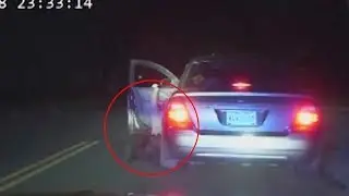 US police officer dragged at high speed by fleeing car