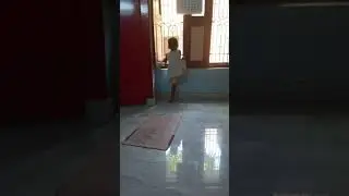 baby climbing first time in the window