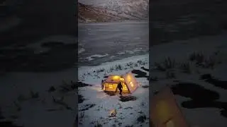 Camping by a frozen Lake
