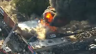 Fire burns through tire shop in Jamaica, Queens