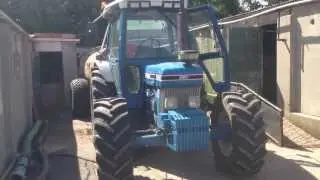Ford 7610 with 1100 Gallon Slurry tanker in a tight farm yard