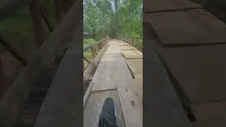 Riding across Old Iron Bridge