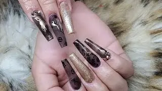 uñas Negeas para noche Divertida / Diseño de uñas louis Vuitton
