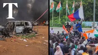 Niger coup supporters filmed outside government headquarters waving Russian flags