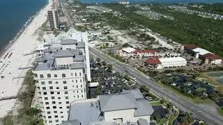 Perdido Key Florida - Drone flight near Villagio Perdido Town Centre shopping plaza and beach.
