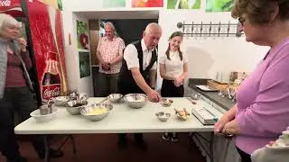 Overseas Adventure Travel Group making Czech Homemade Cake at Hotel U Ruze in Slavonice Czechia.